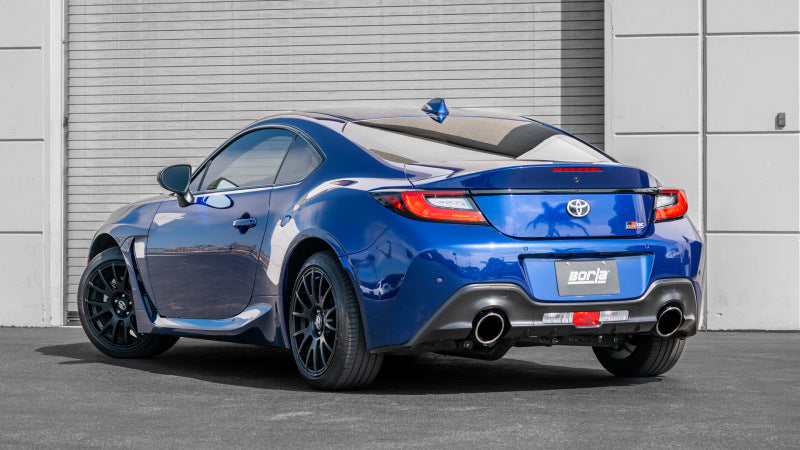 Borla 22-23 Subaru BRZ/Toyota GR86 2.4L RWD AT/MT ATAK Catback Exhaust - Polished Tips on blue car.