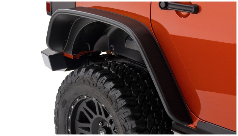Bushwacker 07-18 Jeep Wrangler Unlimited Flat Style Flares 2pc 4-Door Sport Utility Only - Black on offroad tires