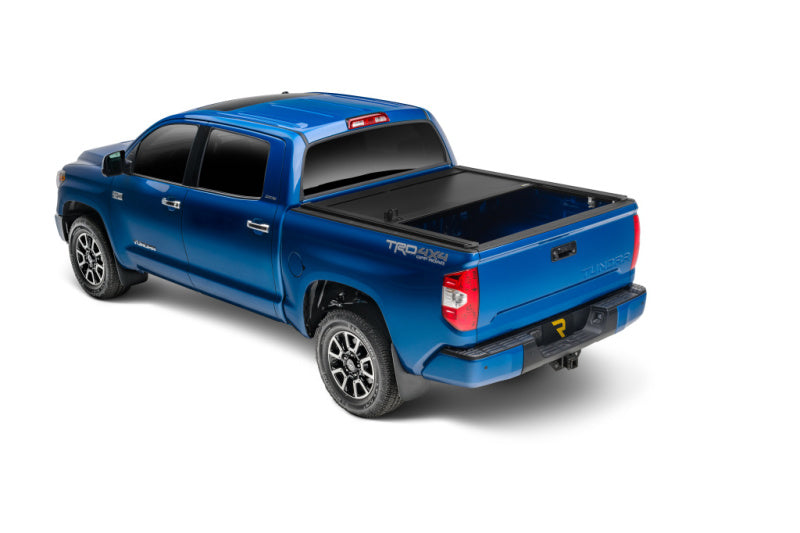 Retrax 2022+ Toyota Tundra (5.7ft Bed w/ Deck Rail System) RetraxONE XR Bed Cover on blue truck