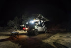 KC HiLiTES C-Series C2 LED 2in. Backup Area Flood Light 20w (Pair Pack System) - Black on offroad vehicle at night