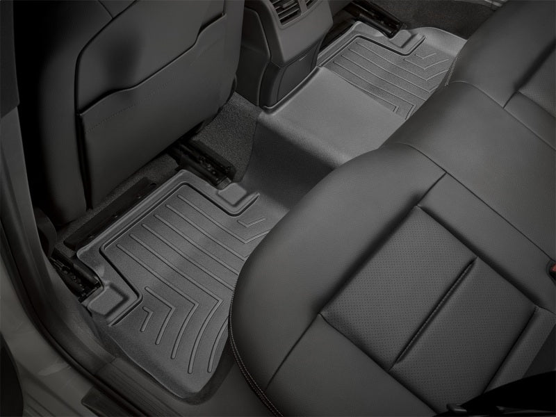 WeatherTech 10-16 Mercedes-Benz E-Class Sedan Rear FloorLiner - Black installed in vehicle cabin for superior carpet protection