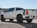 ICON 2019+ GM 1500 1.5-3.5in Stage 1 Suspension System on white truck with offroad wheels