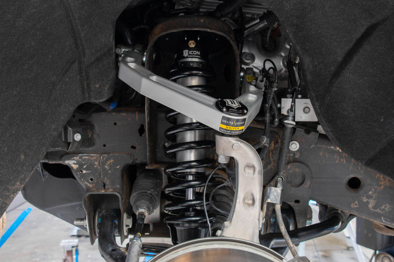 ICON 2019+ GM 1500 Ext Travel 2.5 Series Shocks VS IR Coilover Kit installed in vehicle suspension.