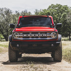 Rigid Industries 21+ Ford Bronco(Excl. 1st Edition) 360-Series PRO SAE Fog Light Kit - White installed on red Bronco.