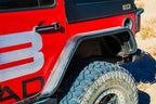 DV8 Offroad 07-18 Jeep Wrangler JK Front & Rear Flat Tube Fenders on a Jeep with offroad tires