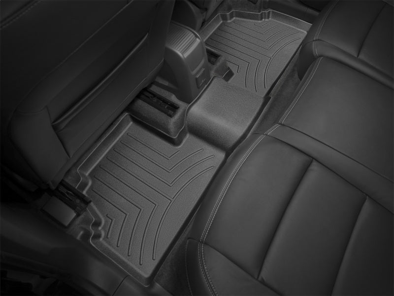 WeatherTech 13+ Buick Encore Rear FloorLiner - Black fitting perfectly in vehicle for ultimate protection.