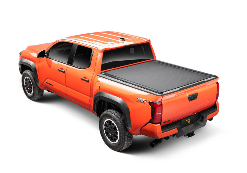 BAK 2024 Toyota Tacoma 5ft Bed Revolver X4ts in orange truck