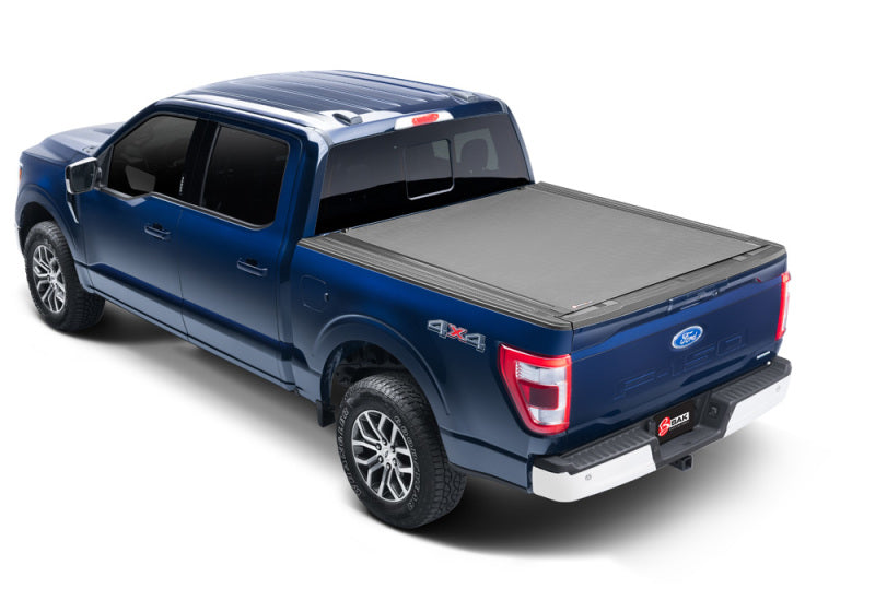 BAK 21-22 Ford F-150 (Incl. 2022 Lightning) Revolver X4s 5.7ft Bed Cover on blue truck