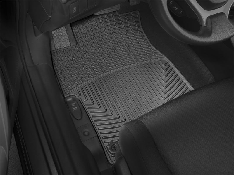 WeatherTech 12-14 Honda Civic Front Rubber Mats - Black installed in car