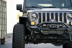DV8 Offroad 18-23 Wrangler JL/Gladiator JT Spec Series Front Bumper with offroad tires and accessories