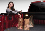 Retrax 09-up Ram 1500 6.5ft Bed / 10-up Short Bed PowertraxPRO MX in use with groceries in truck bed.