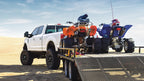 Air Lift Universal Air Spring Cradle on lifted truck with ATVs