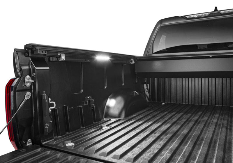 Retrax 2024 Ford F-150 SuperCrew/Super Cab 5.5ft. Bed Retrax EQ with interior lighting and sturdy bed liner.