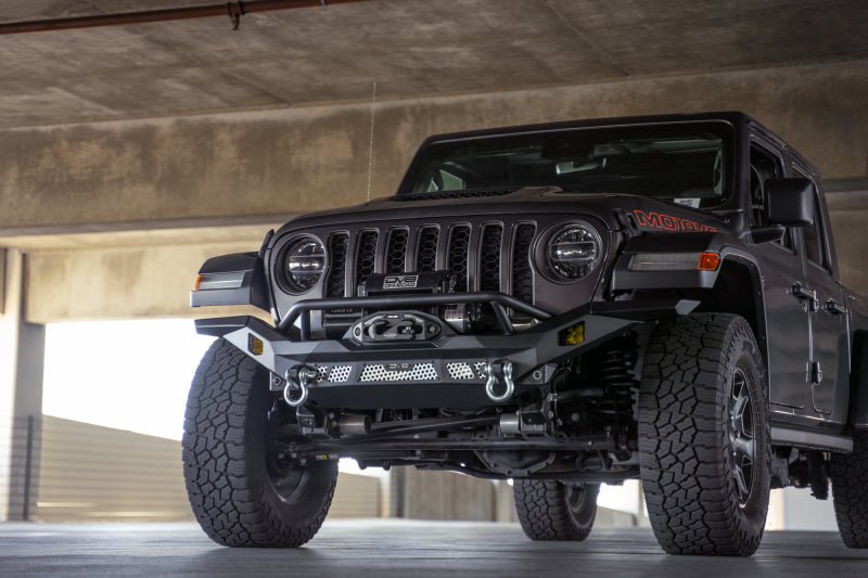 DV8 Offroad 07-18 Jeep Wrangler JK / 18-23 Wrangler JL / 20-23 Gladiator JT MTO Series Front Bumper on off-road vehicle