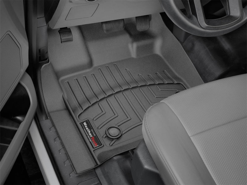 WeatherTech 2015+ Ford F-150 SuperCrew/SuperCab Front FloorLiner - Black in vehicle interior.