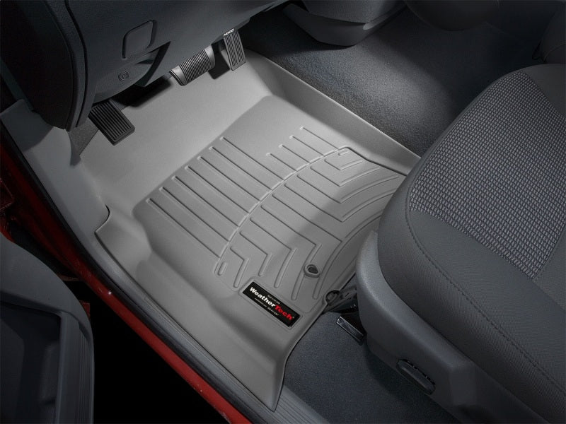 WeatherTech 02-06 Dodge Ram 1500 Pickup QuadCab Front FloorLiner - Grey installed in truck interior