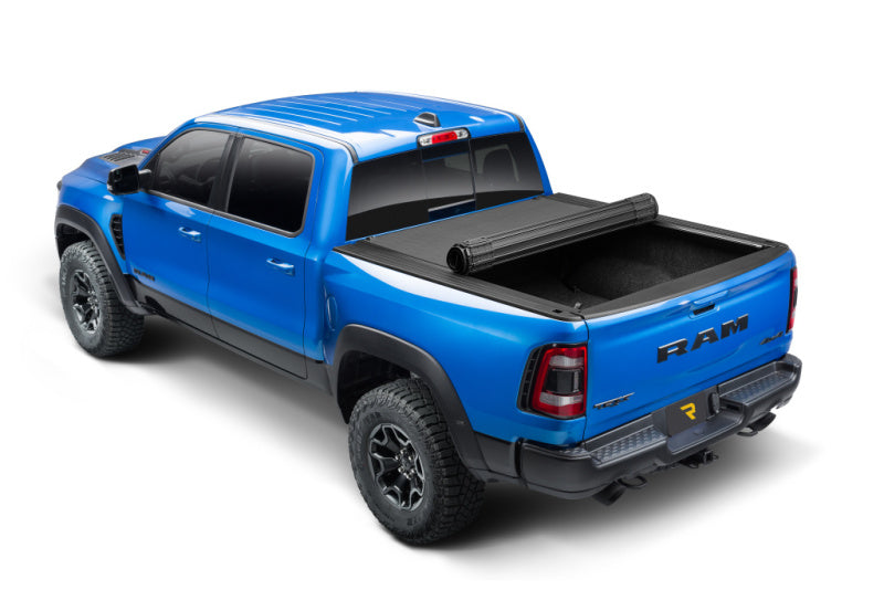 BAK 09-18 1500 Dodge Ram (19-20 Classic) w/o Ram Box Revolver X4s 5.7ft Bed Cover on blue RAM truck