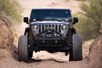 DV8 Offroad 18-22 Jeep Gladiator JT Cowl Light Bar Bracket in action on a rugged trail
