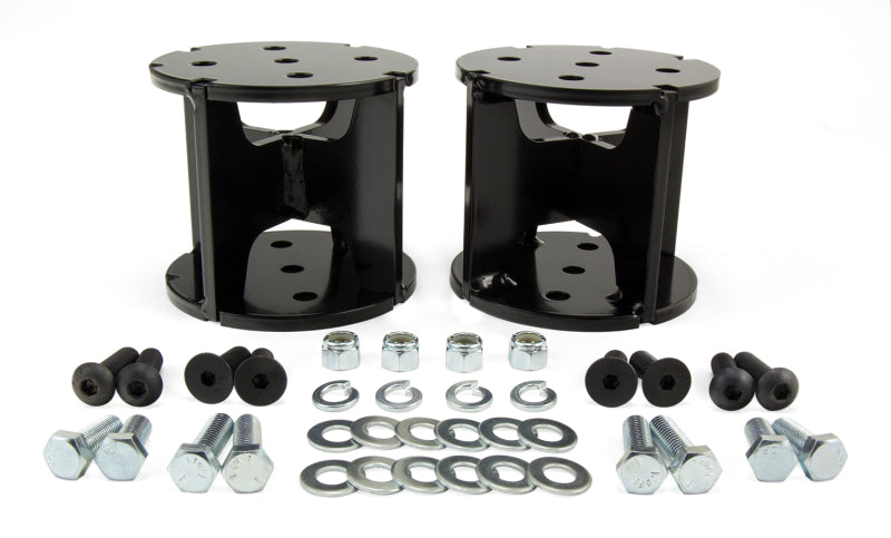 Air Lift Universal Level Air Spring Spacer - 4in Lift kit with hardware for truck suspension upgrades.