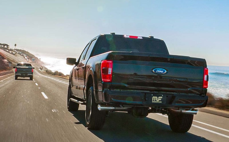 MagnaFlow Sys C/B 11-15 Ford Super Duty F250 6.2L EC CC, SS 3.5in Single Rear Pass Side Ext 5in Tip on highway.