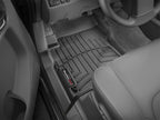 WeatherTech 08+ Nissan Frontier Front FloorLiner - Black installed in truck interior