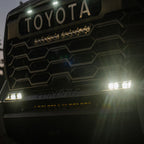 Baja Designs 2022+ Toyota Tundra S2 SAE OEM Fog Light Replacement Kit - Clear installed on truck.
