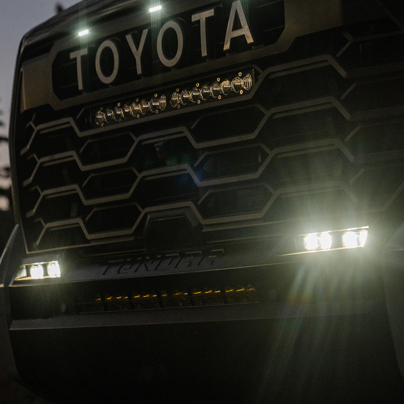 Baja Designs 2022+ Toyota Tundra S2 SAE OEM Fog Light Replacement Kit - Clear installed on truck.