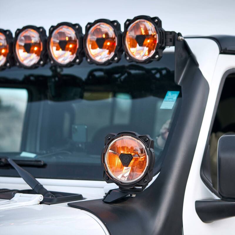 KC HiLiTES Gravity Titan LED 6in. - Pair Pack (Wide-40 Beam) on Jeep exterior for offroad lighting and performance upgrades.