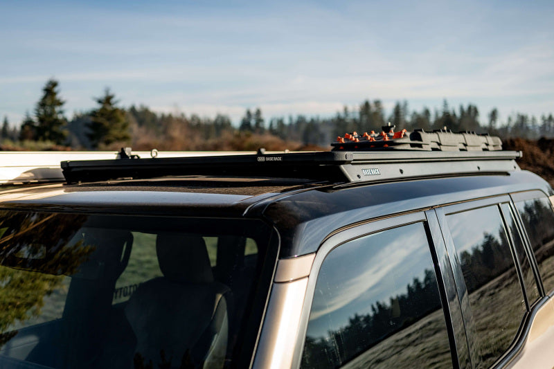 ARB Base Rack Mount Kit and Deflector for 24+ Land Cruiser Prado 250 roof view with accessories