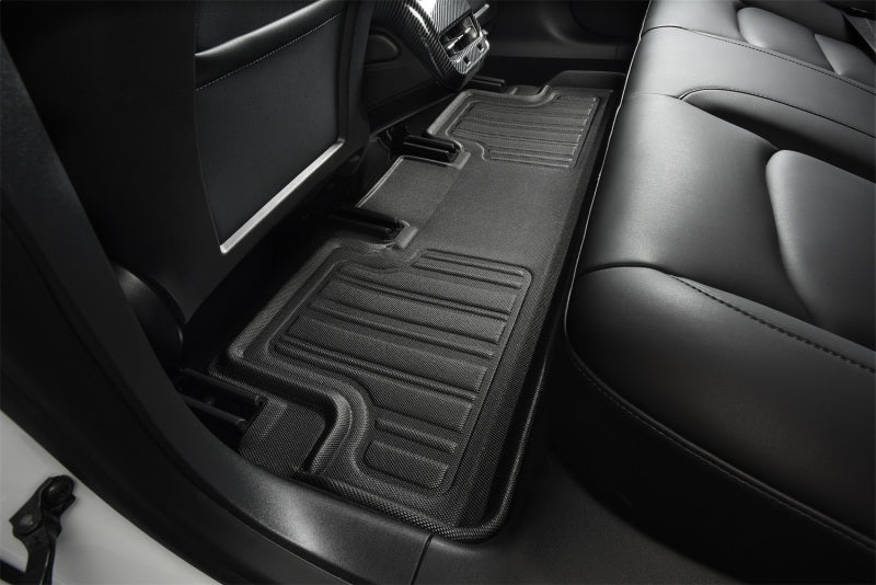3D MAXpider 21-22 Tesla Model Y 7-Seat Elitect Black R1 R2 R3 floor liner in vehicle interior.