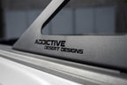 Addictive Desert Designs 17-19 Ford F-150 Raptor Stealth Fighter Chase Rack close-up.