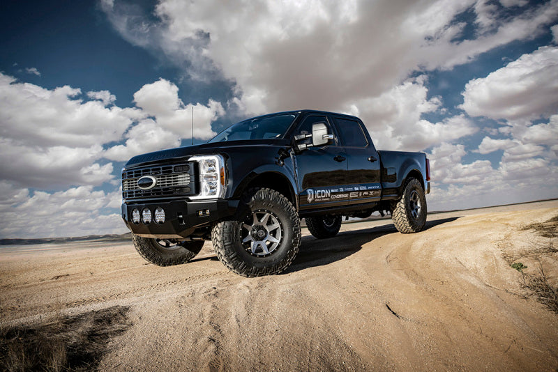 ICON 23-25 Ford F-250/F-350/F-450 Super Duty 2-5.5in Lift Radius Arm System on offroad terrain