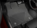WeatherTech 2015+ Volkswagen Golf/GTI (5-Door Hatchback Only) Front Rubber Mats - Black installed in vehicle interior.