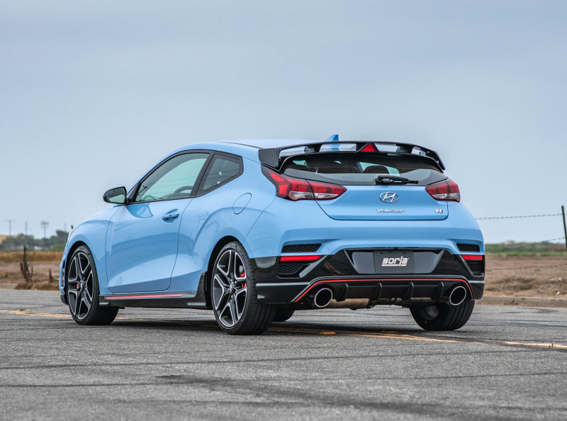 Borla 19-20 Hyundai Veloster N 2.0L I4 MT FWD 2DR 3in ATAK CatBack Exhaust w/ SS Tips on a blue Hyundai Veloster N