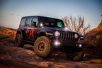 Fox 2018+ Jeep JL Factory Series Remote Res. Rear Shock / 3.5-4in. Lift w/ DSC on rugged terrain with offroad wheels.