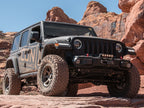 ICON 2018+ Jeep Wrangler JL 2.5in Stage 2 Suspension System in action on rugged terrain.