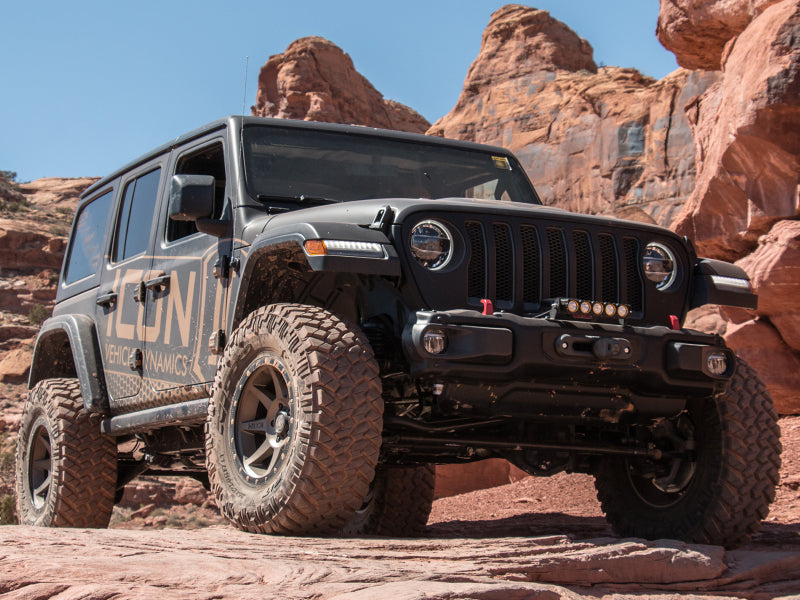 ICON 2018+ Jeep Wrangler JL 2.5in Stage 2 Suspension System in action on rugged terrain.