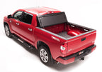 BAK 2024 Toyota Tacoma 5ft Bed BAKFlip G2 on red truck