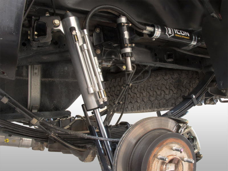 ICON 10-14 Ford Raptor Multi Rate Rxt Leaf Pack w/Add In Leaf suspension system installation on offroad truck.