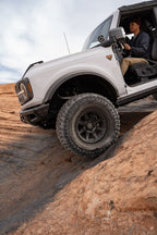 ICON Rebound Pro 17x8.5 6x5.5 0mm Offset 4.75in BS 106.1mm Bore Satin Black Wheel on offroad vehicle