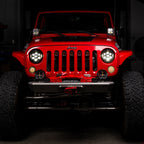 Baja Designs 07-18 Jeep Wrangler JK DOT LP6 LED Headlight Kit (For LED Headlights)- Amber on modified Jeep with offroad tires