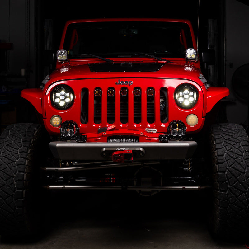 Baja Designs 07-18 Jeep Wrangler JK DOT LP6 LED Headlight Kit (For LED Headlights)- Amber on modified Jeep with offroad tires