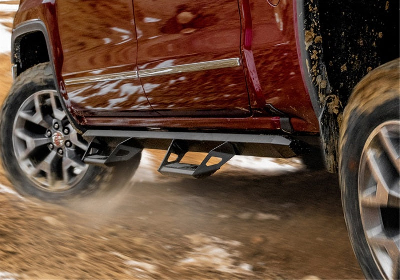 N-Fab Predator Pro Step System 14-18 Toyota 4 Runner SUV 4 Door Gas - Tex Black on offroad terrain