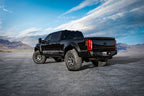 ICON 1999+ Ford F-250/F-350 Super Duty 0-3in Rear 2.5 Series Shocks VS PB - Pair on lifted truck with offroad tires.