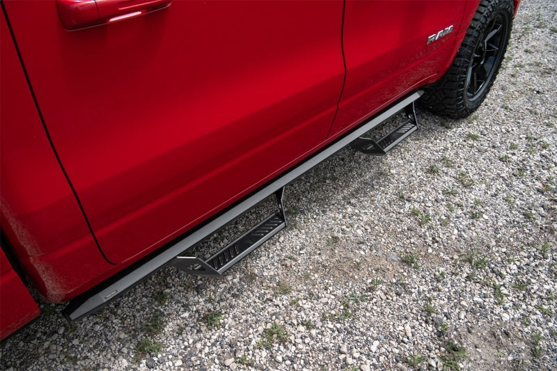 N-Fab Predator Pro Step System 2019 Dodge Ram 2500/3500 Crew Cab All Beds Gas/Diesel - Tex. Black installed on red truck
