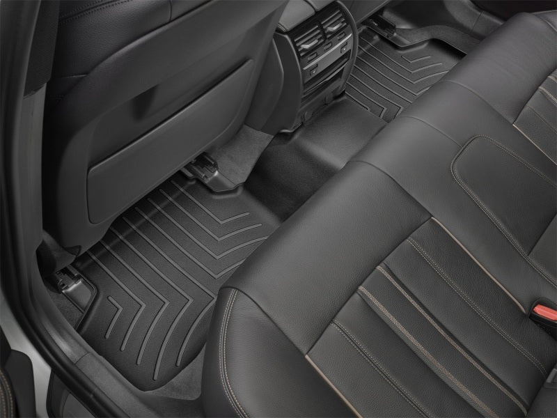 WeatherTech 17+ BMW 5-Series Rear FloorLiner - Black (X-Drive Only) in a BMW interior