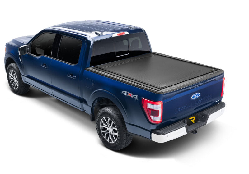 Retrax 21-22 Ford F-150 Super Crew/Super Cab (Incl. 2022 Lightning) 5.5ft Bed RetraxONE MX installed on blue truck Main image