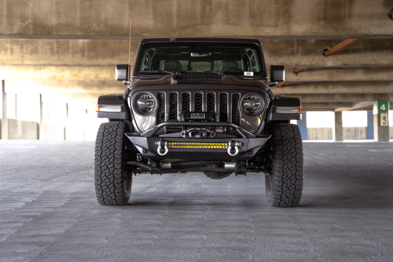 DV8 Offroad 07-23 Jeep Wrangler JK/JL & Gladiator JT FS-1 Series Stubby Front Bumper in parking garage.