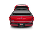 BAK 21-22 Ford F-150 (Incl. 2022 Lightning) BAKFlip MX4 5.7ft Bed Cover - Matte Finish on red truck