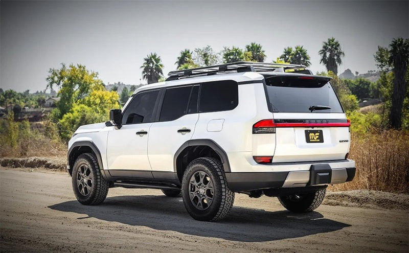 Magnaflow 2024 Lexus GX550 Overland Series Cat-Back Performance Exhaust System on an SUV in nature.